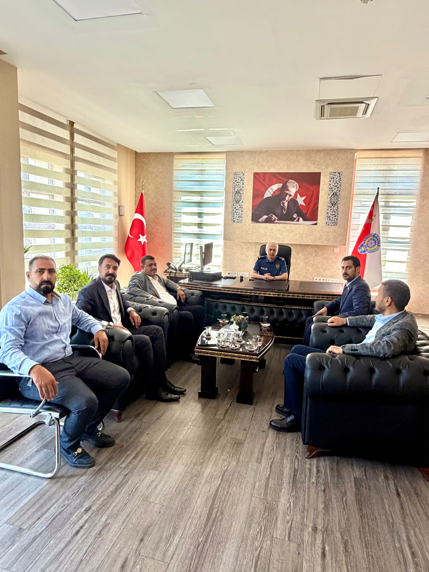 MHP Viranşehir Yönetim Kurulu, İlçe Emniyet Müdürü Tuncay Yardım'ı makamında ziyaret etti